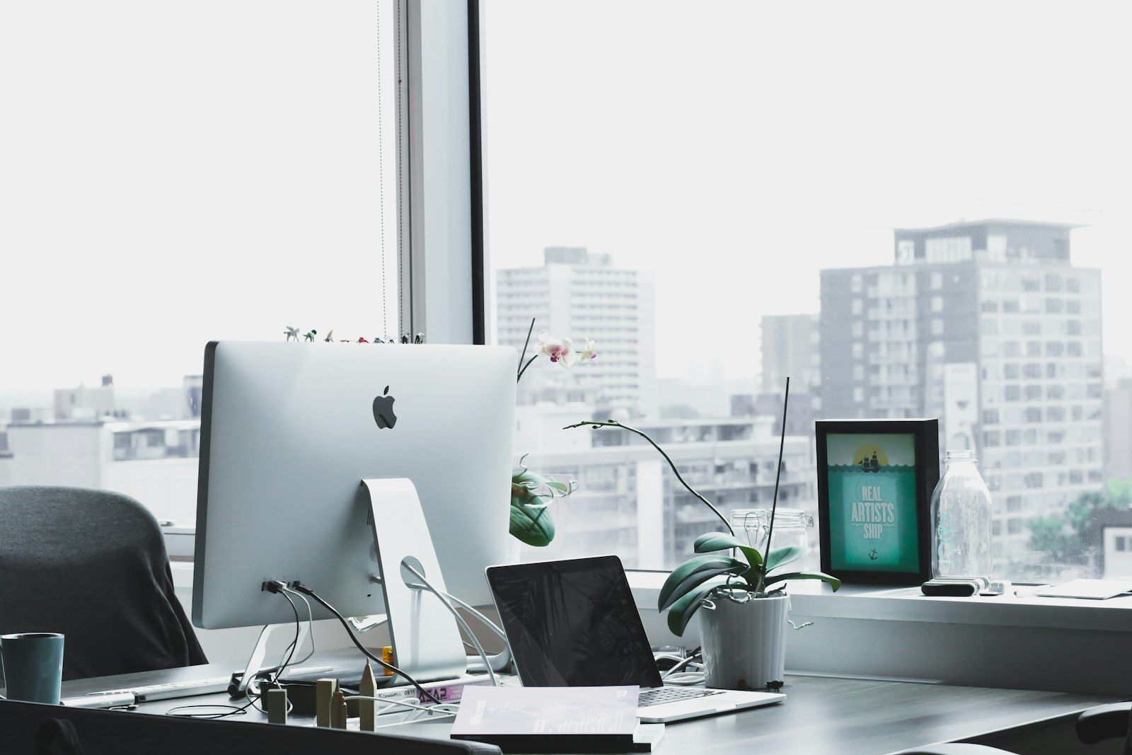 Modern office workspace with large windows