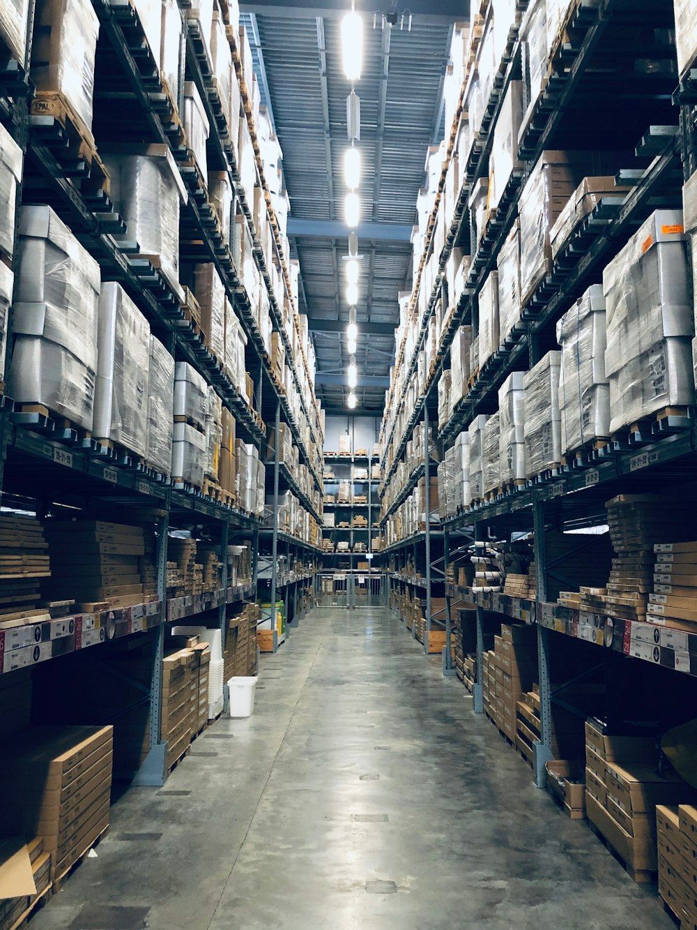 Tall warehouse racking aisle