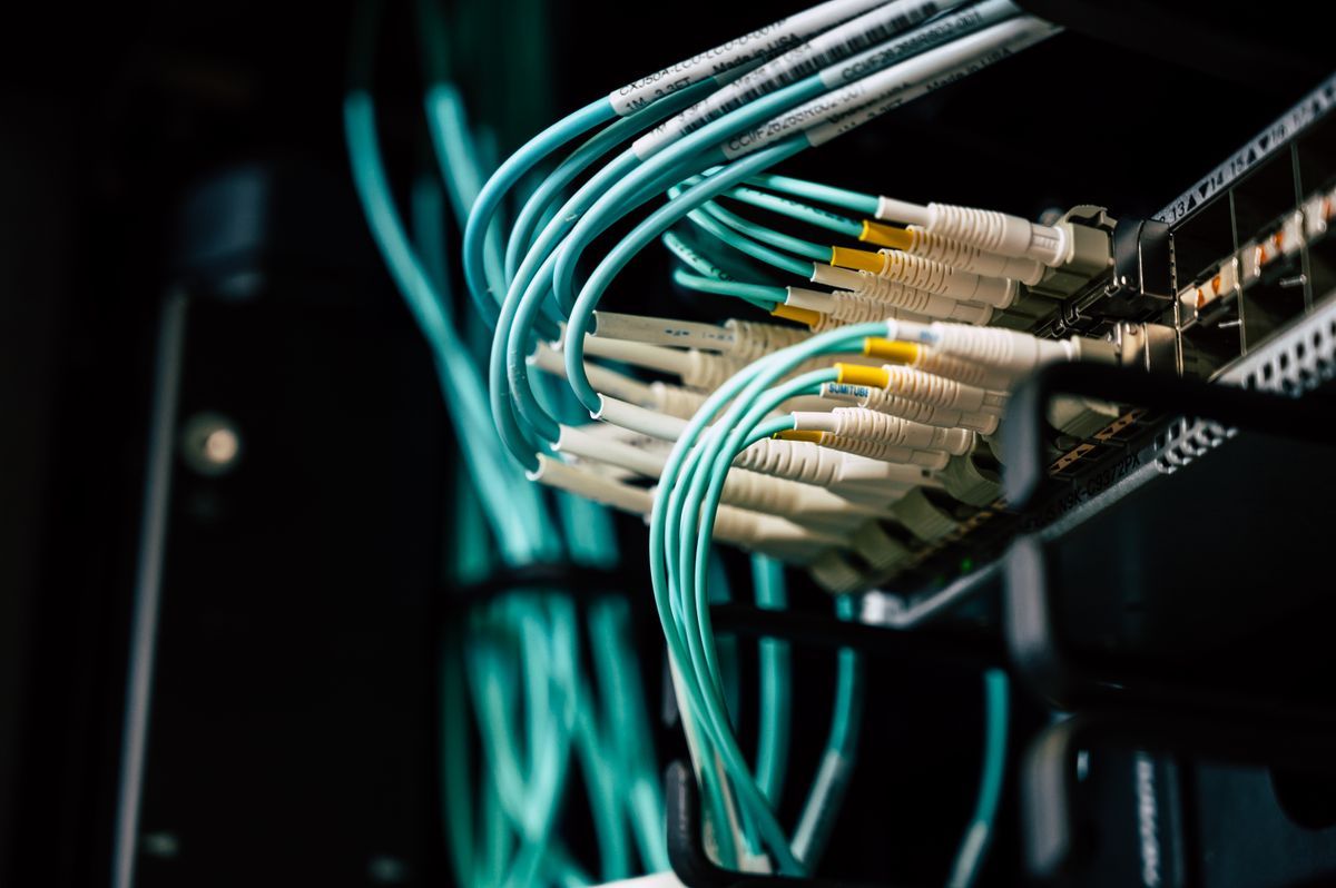 Fiber optic patch cords with LC connectors plugged into a switch